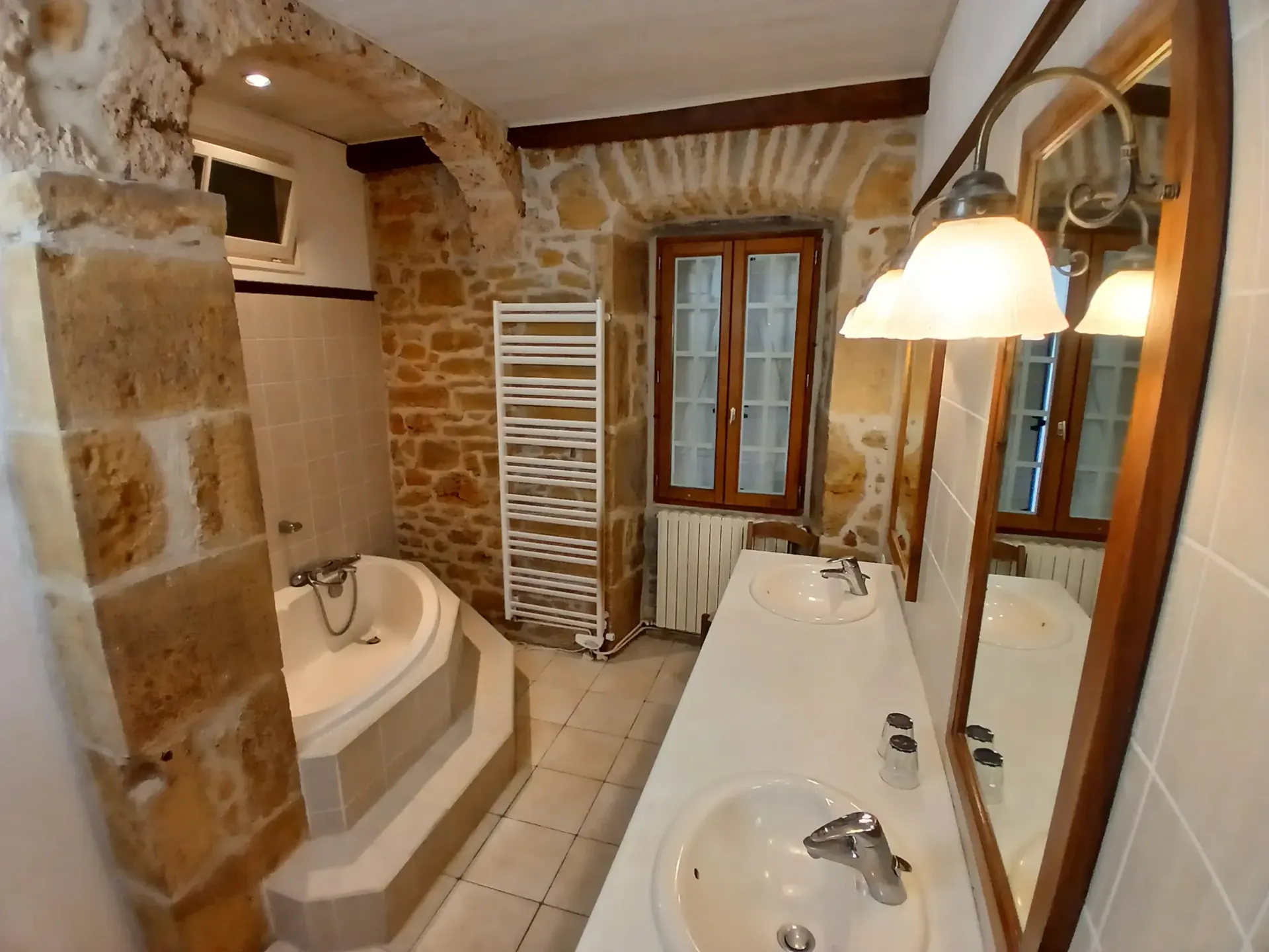 The ensuite bathroom of Jean Mouliérat with a double washbasin